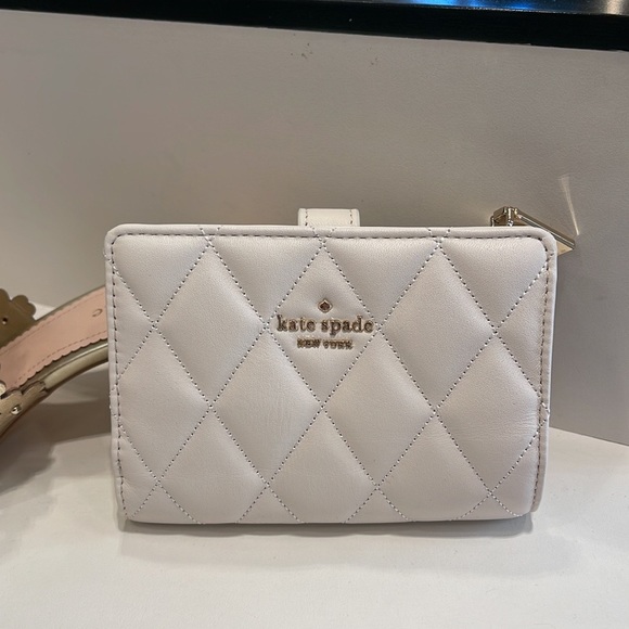 Kate Spade Carey Medium Compartment Bifold Wallet 
COLOR: Parchment - Picture 4 of 16